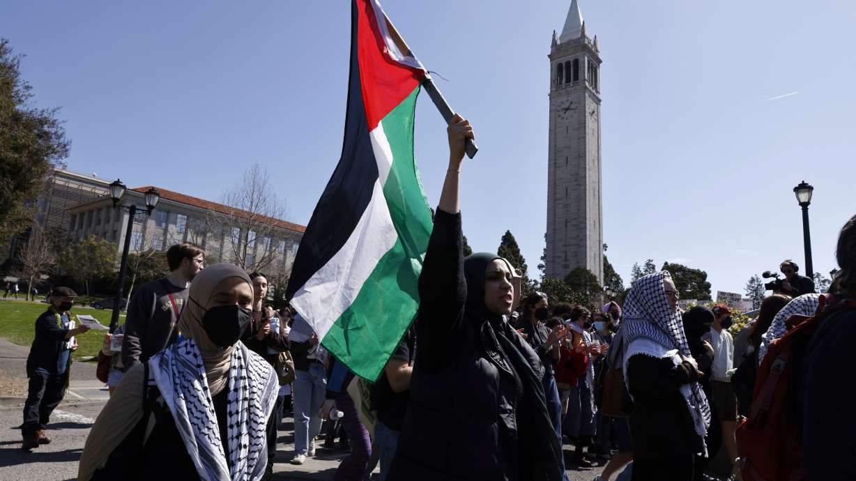 Protesters march on campus against the arrest of Mahmoud Khalil at UC Berkeley on Tuesday, in Berkeley, Calif.