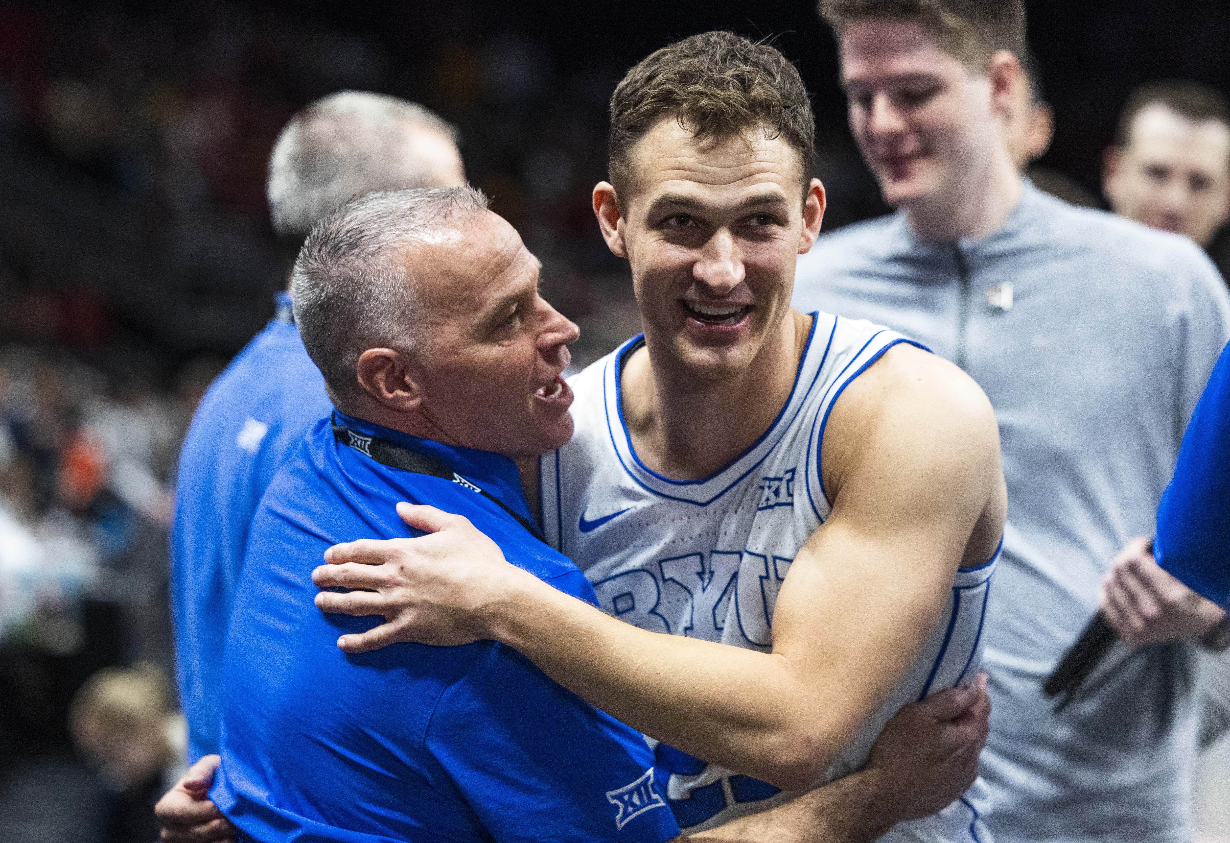 Brigham Young guard Trevin Knell (21) celebrates with Brigham Young University President Shane Reese after BYU’s victory over the Iowa State Cyclones in a quarterfinals game of the Big 12 Championship at the T-Mobile Center in Kansas City, Missouri, on Thursday, March 13, 2025.