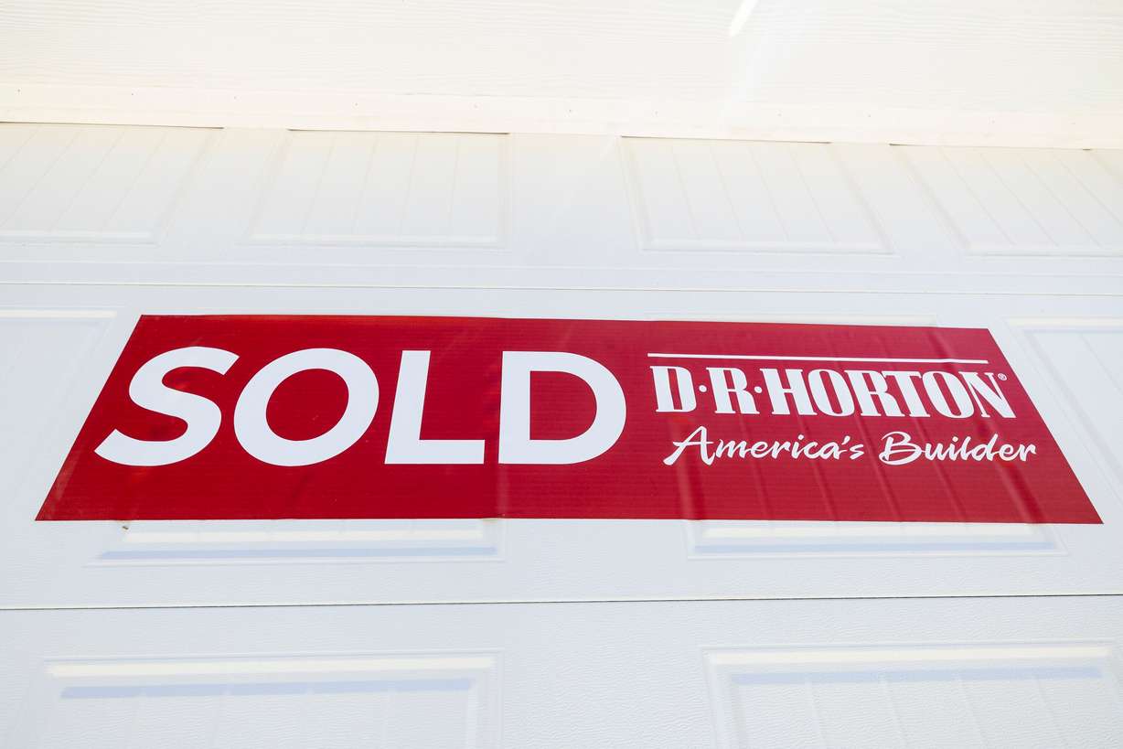 A “sold” sign is displayed on a home in Lehi on Aug. 13, 2024.