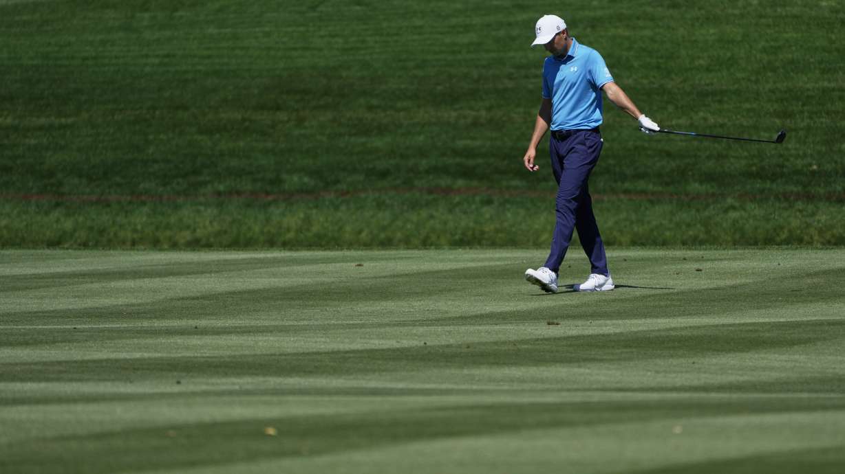 Jordan Spieth walks up the ninth fairway during the first round of The Players Championship golf tournament Thursday, March 13, 2025, in Ponte Vedra Beach, Fla.