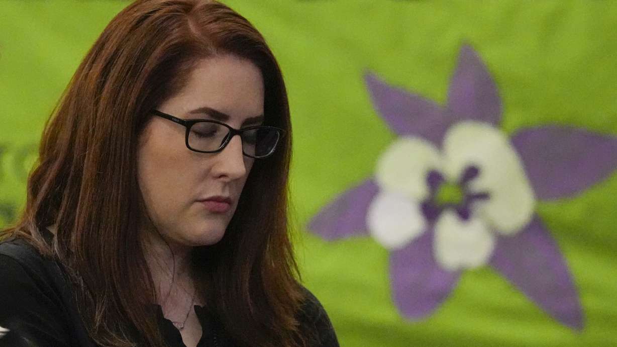 Columbine High School shooting survivor Anne Marie Hochhalter attends a vigil for the 25th anniversary of the mass shooting, April 19, 2024, in Denver. Hochhalter, paralyzed in shooting, died of sepsis caused by complications from her paralysis.