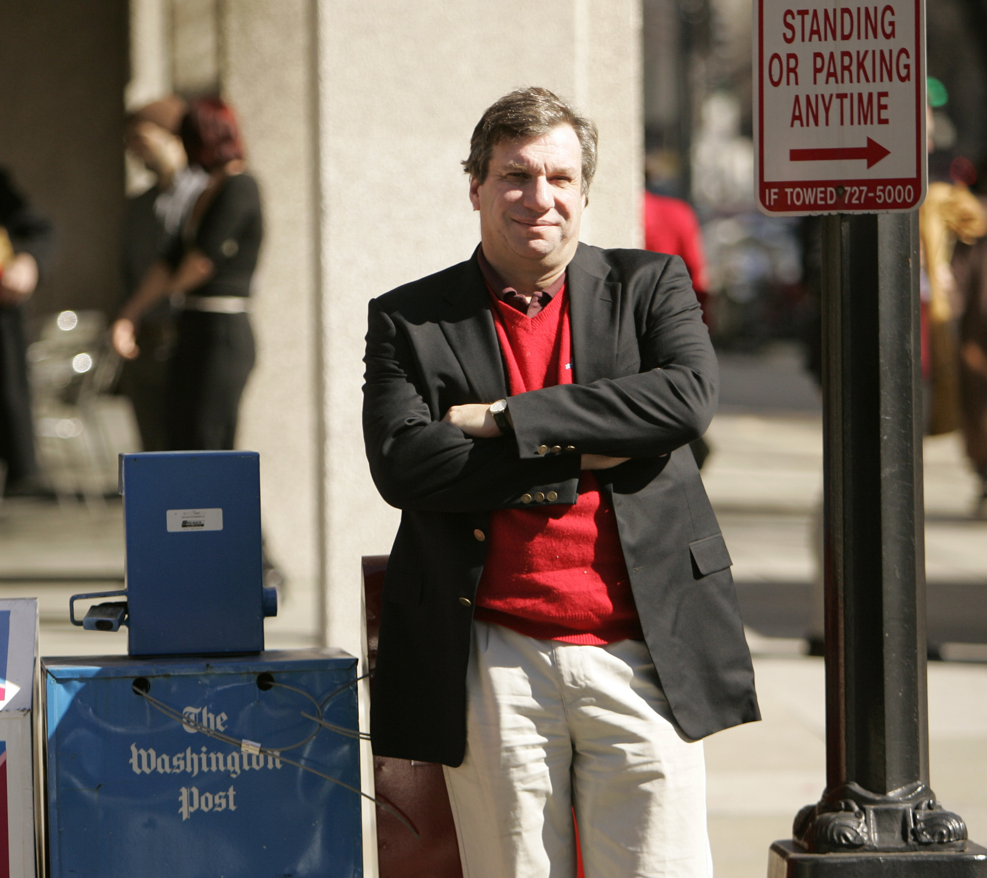 FILE - Sports writer and author John Feinstein poses in Washington, Feb. 28, 2006.