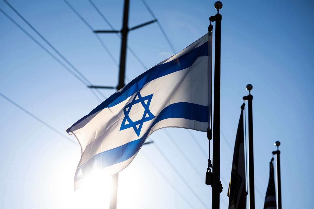 The Israeli flag waves outside of Congregation Kol Ami in Salt Lake City on Feb. 28.