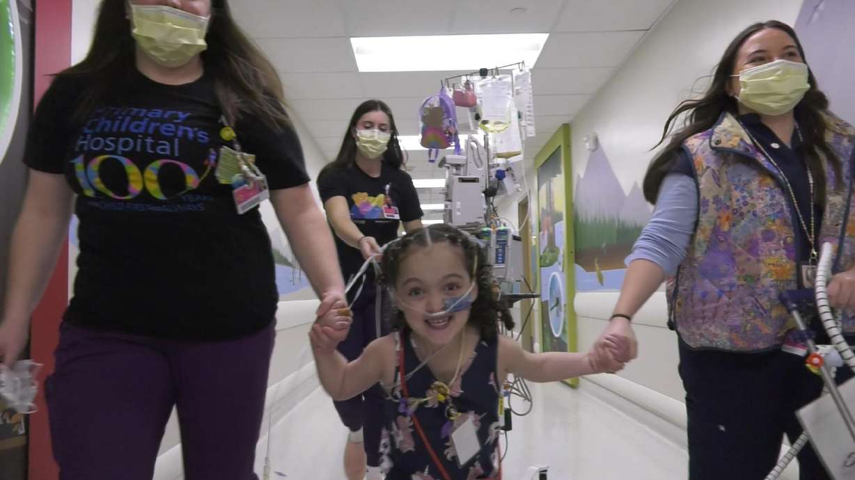 Sienna Barton, 4, runs through the halls at Primary Children's Hospital. She is one of the first heart patients to participate in the hospital's cardiac rehab program.