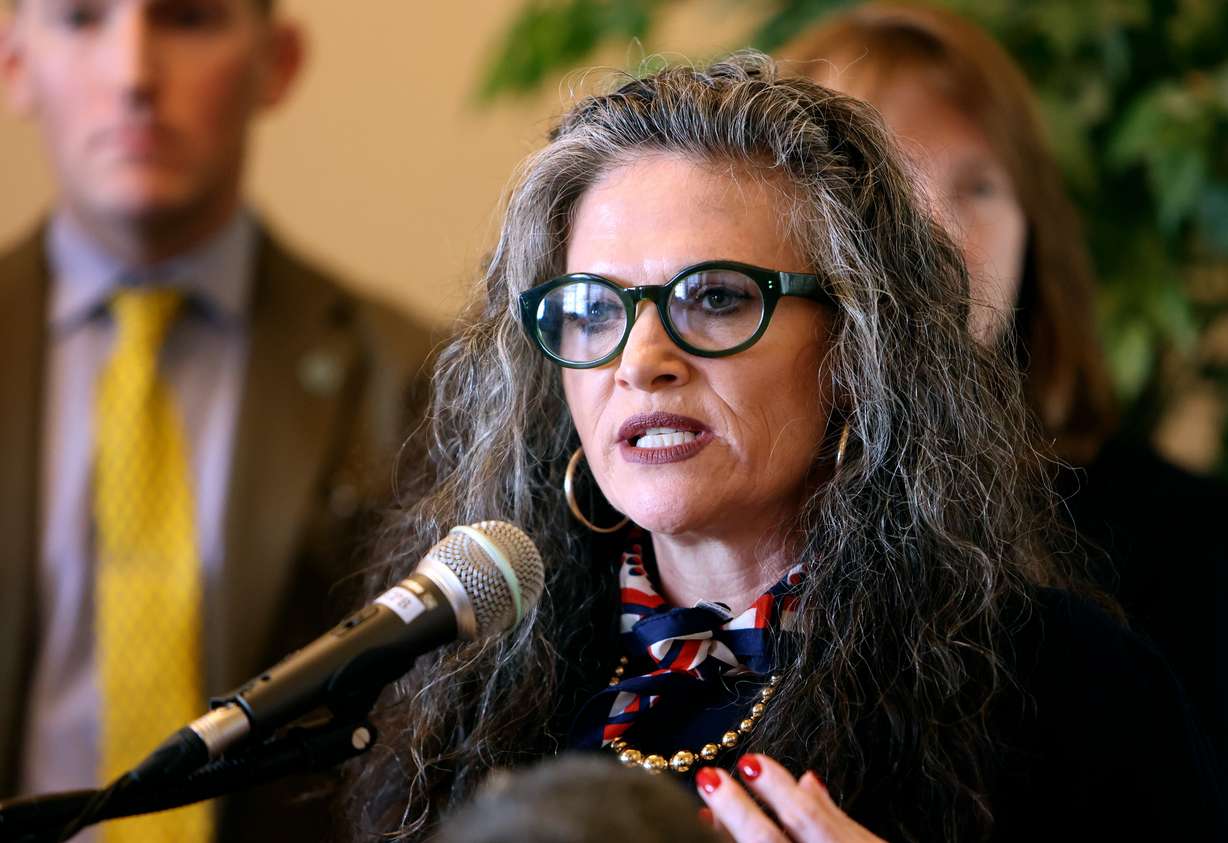 Senate Minority Assistant Whip Jen Plumb, D-Salt Lake City, talks to members of the media during the first day of the 2025 legislative session in the Senate Minority Caucus room at the Capitol in Salt Lake City on Jan. 21.