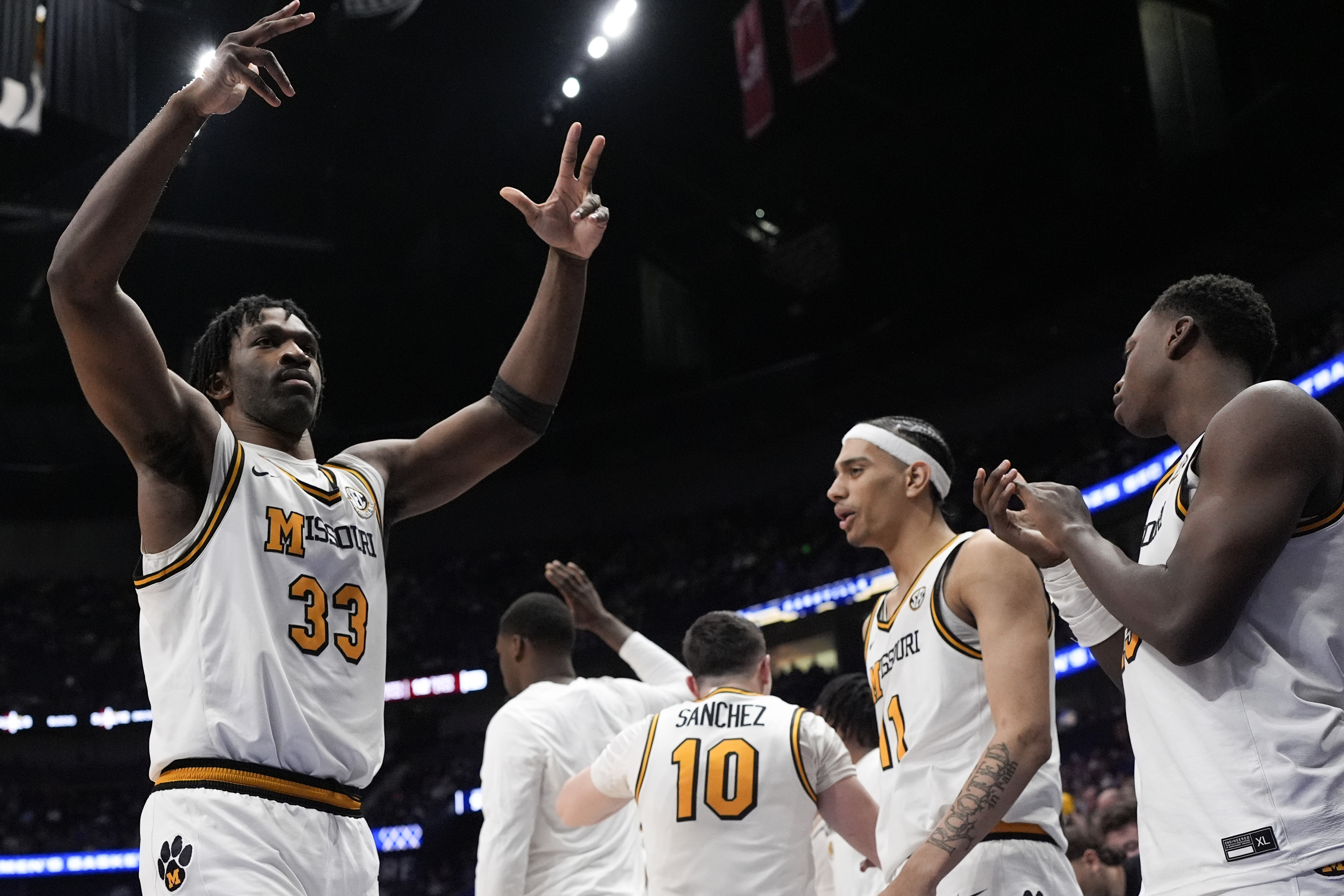 Missouri center Josh Gray (33) celebrates victory over Mississippi State after the second half of an NCAA college basketball game in the second round of the Southeastern Conference tournament, Thursday, March 13, 2025, in Nashville, Tenn.