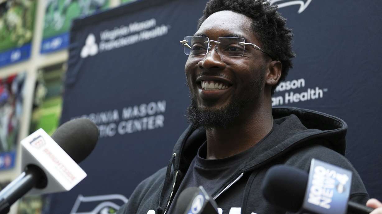 Seattle Seahawks defensive end DeMarcus Lawrence speaks to the media Thursday, March 13, 2025, at the NFL football team's facilities in Renton, Wash.