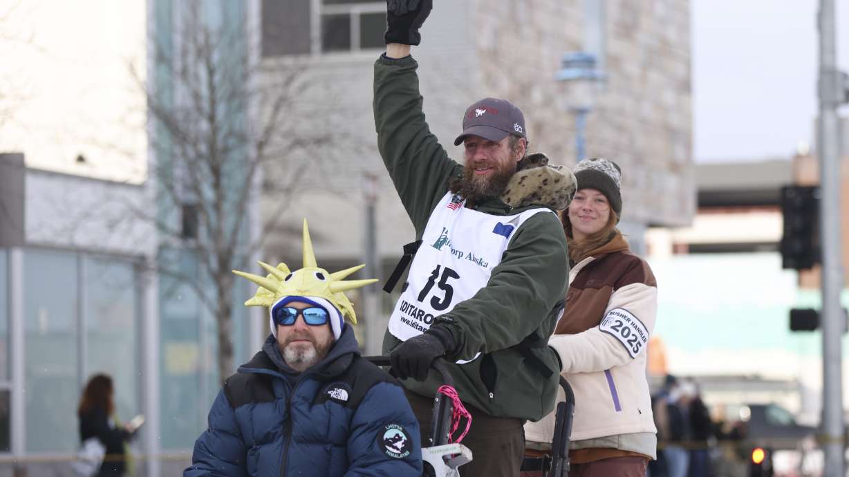 FILE - Jessie Holmes (15), of Alabama, mushes down Fourth Street during the Ceremonial Start of the Iditarod Trail Sled Dog Race in Anchorage, Alaska., Saturday, March 1, 2025.