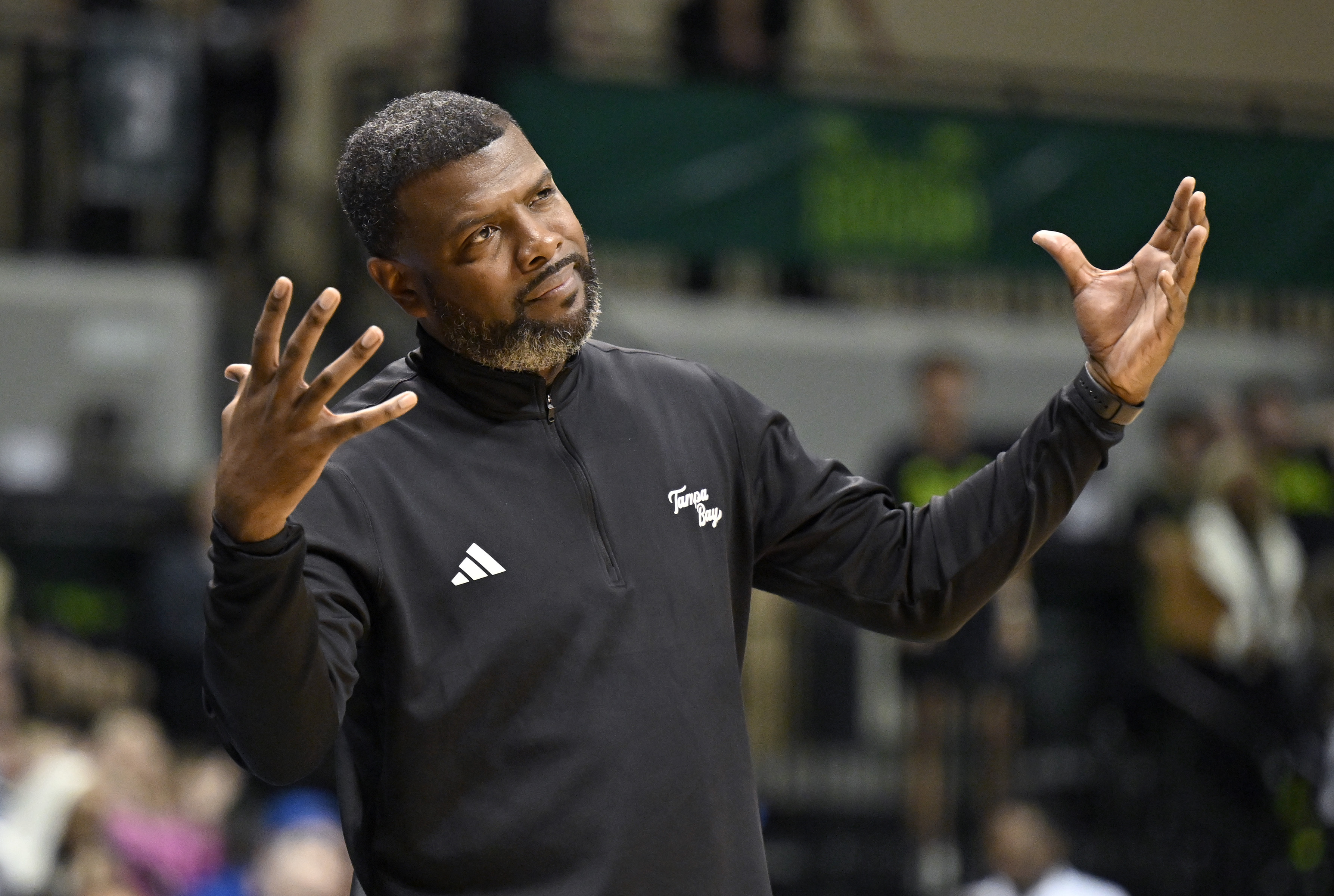 South Florida head coach Ben Fletcher reacts to a call during the first half of an NCAA college basketball game against Memphis Thursday, Feb. 13, 2025, in Tampa, Fla.