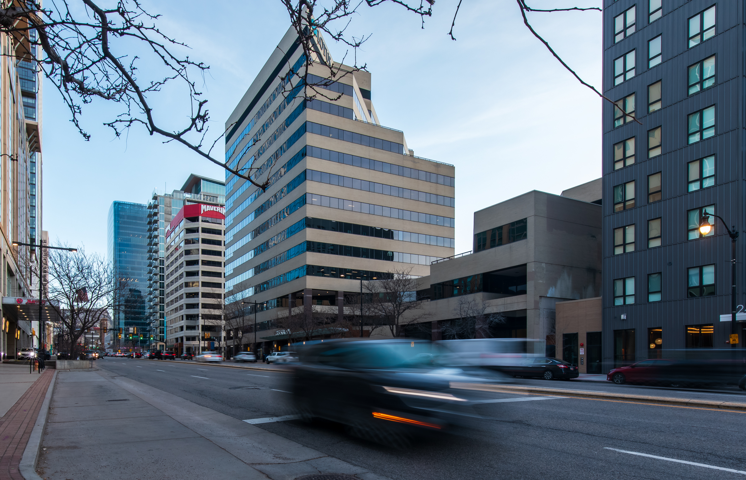 Vehicles travel past Second + State on State Street in downtown Salt Lake City on Tuesday.