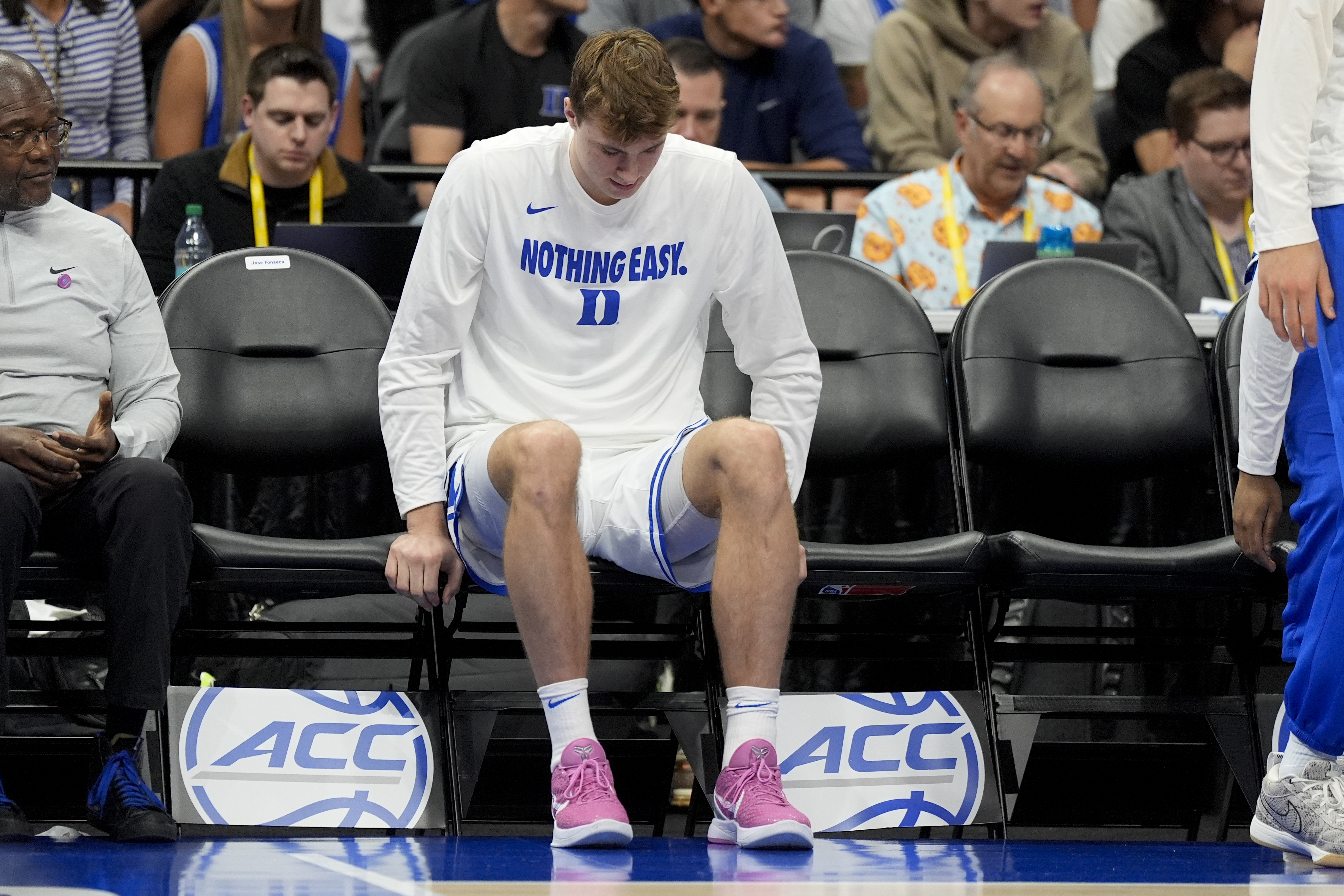 Duke forward Cooper Flagg sits on the bench during the second half of an NCAA college basketball game against Georgia Tech in the quarterfinals of the Atlantic Coast Conference tournament, Thursday, March 13, 2025, in Charlotte, N.C. Flagg was injured in the first half.