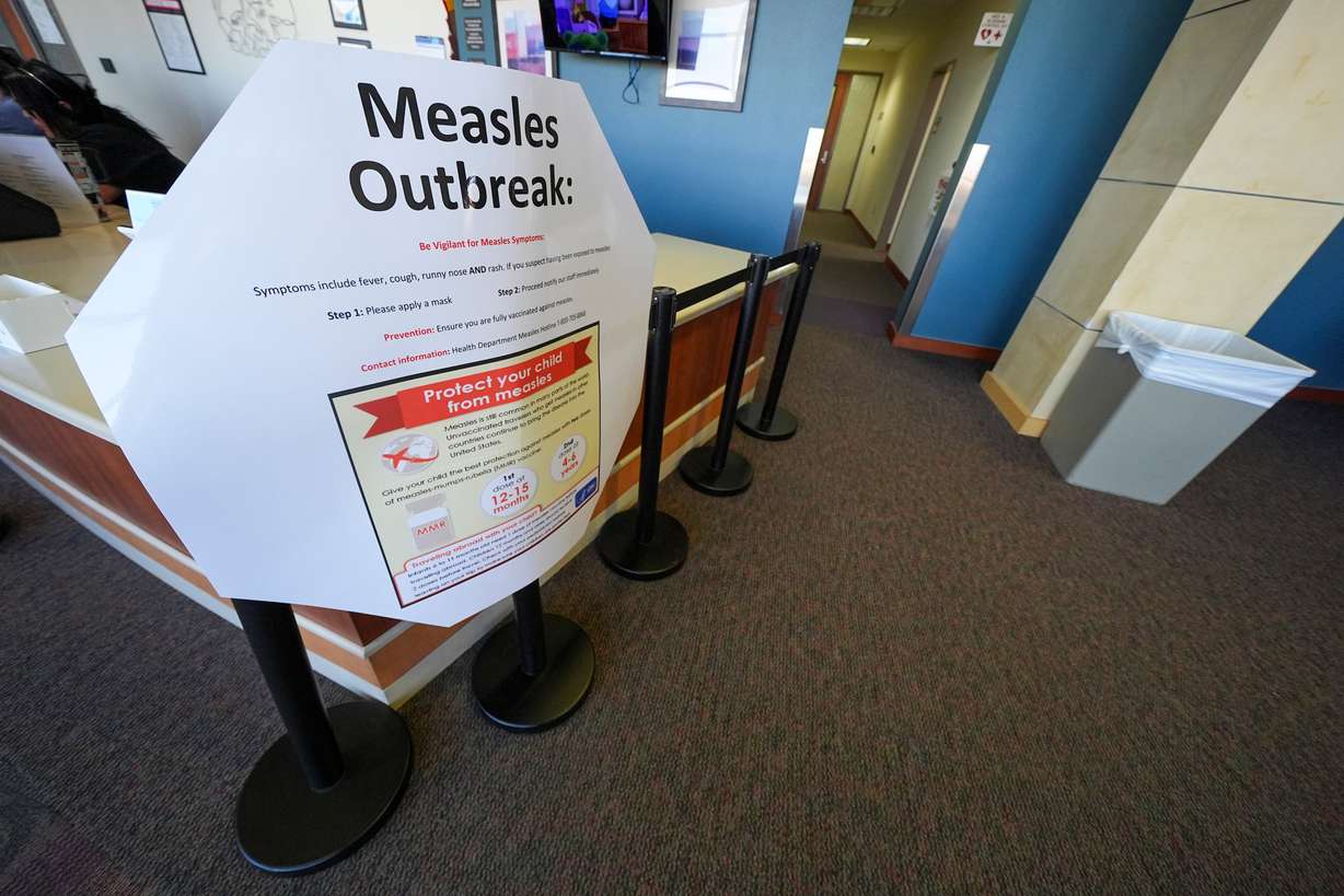 A measles sign is seen at the Texas Tech University Health Sciences Center, Feb. 25 in Lubbock, Texas.