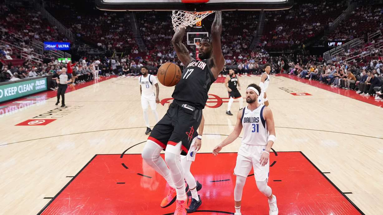 Houston Rockets forward Tari Eason (17) dunks during the first half of an NBA basketball game against the Dallas Mavericks in Houston, Friday, March 14, 2025.