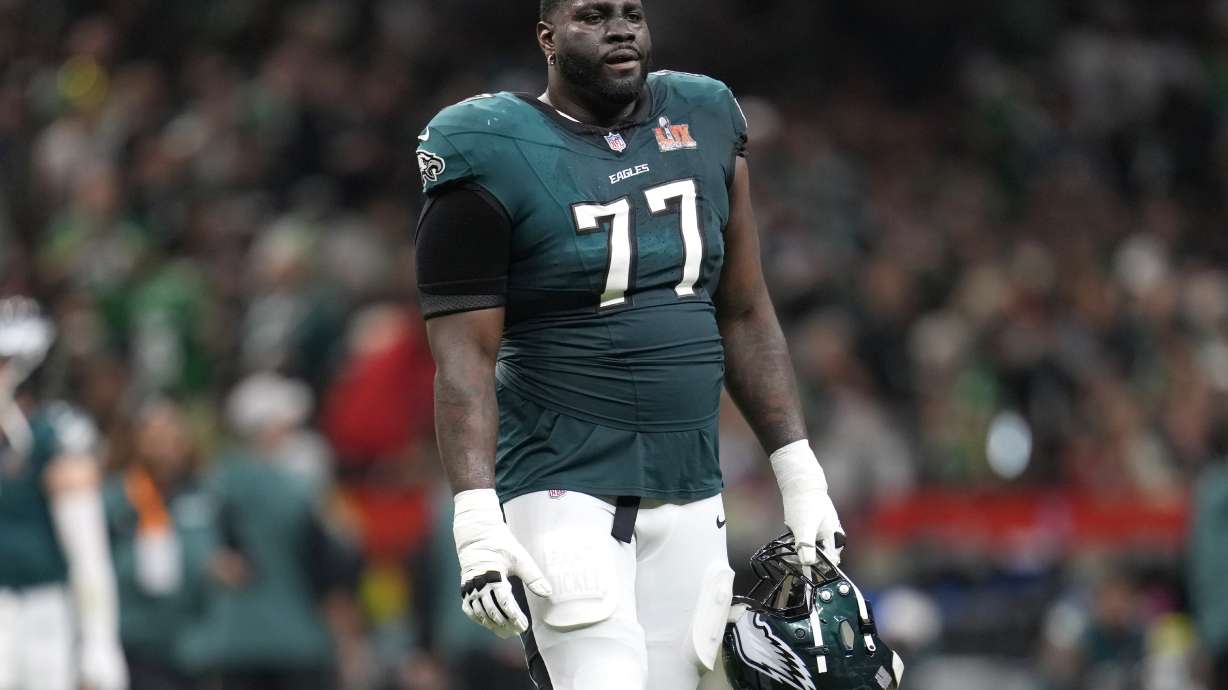 FILE -Philadelphia Eagles offensive tackle Mekhi Becton (77) stands on the field during the first half of the NFL Super Bowl 59 football game against the Kansas City Chiefs, Feb. 9, 2025, in New Orleans. , File)