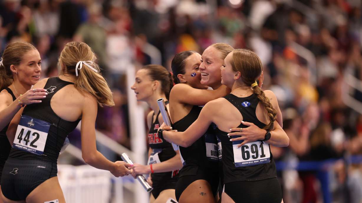 BYU women's distance medley relay team celebrates a national championship for the second straight year at the NCAA indoor track and field championships, Friday, March 17, 2025 in Virginia Beach, Virginia.