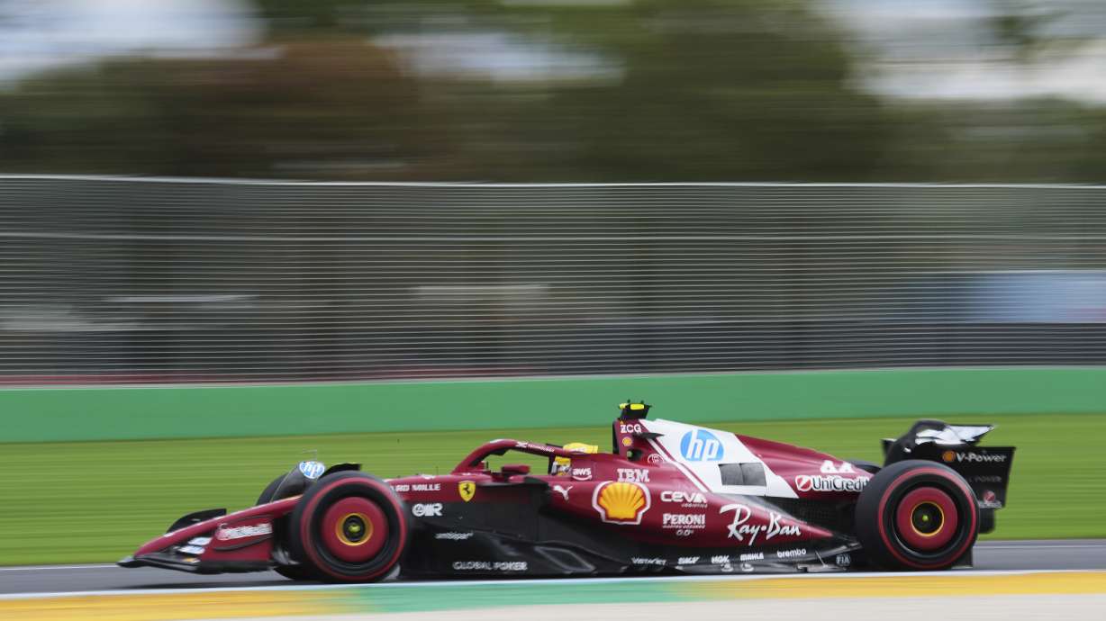Ferrari driver Lewis Hamilton of Britain steers his car during qualifying at the Australian Formula One Grand Prix at Albert Park, in Melbourne, Australia, Saturday, March 15, 2025.