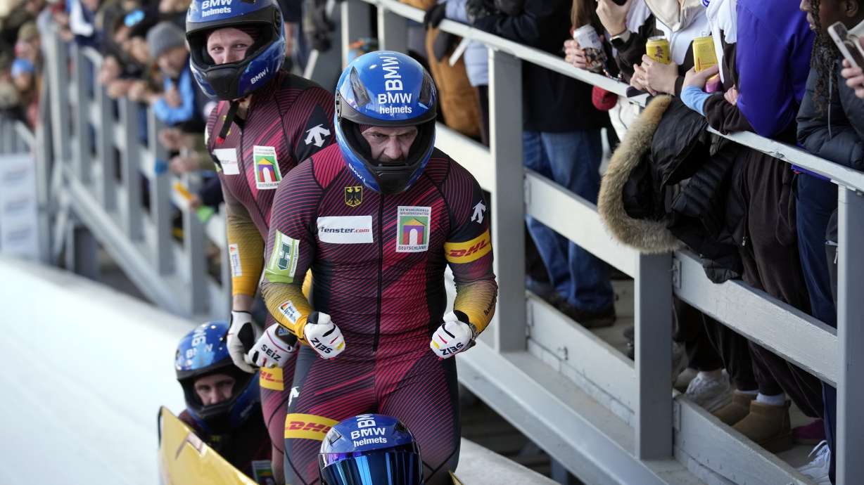 Germany's Francesco Friedrich, Matthias Sommer, Alexander Schuller and Felix Straub celebrate after finishing their run in the fourth heat of the 4-man bobsled race during the bobsled world championships, Saturday, March 15, 2025, in Lake Placid, N.Y.
