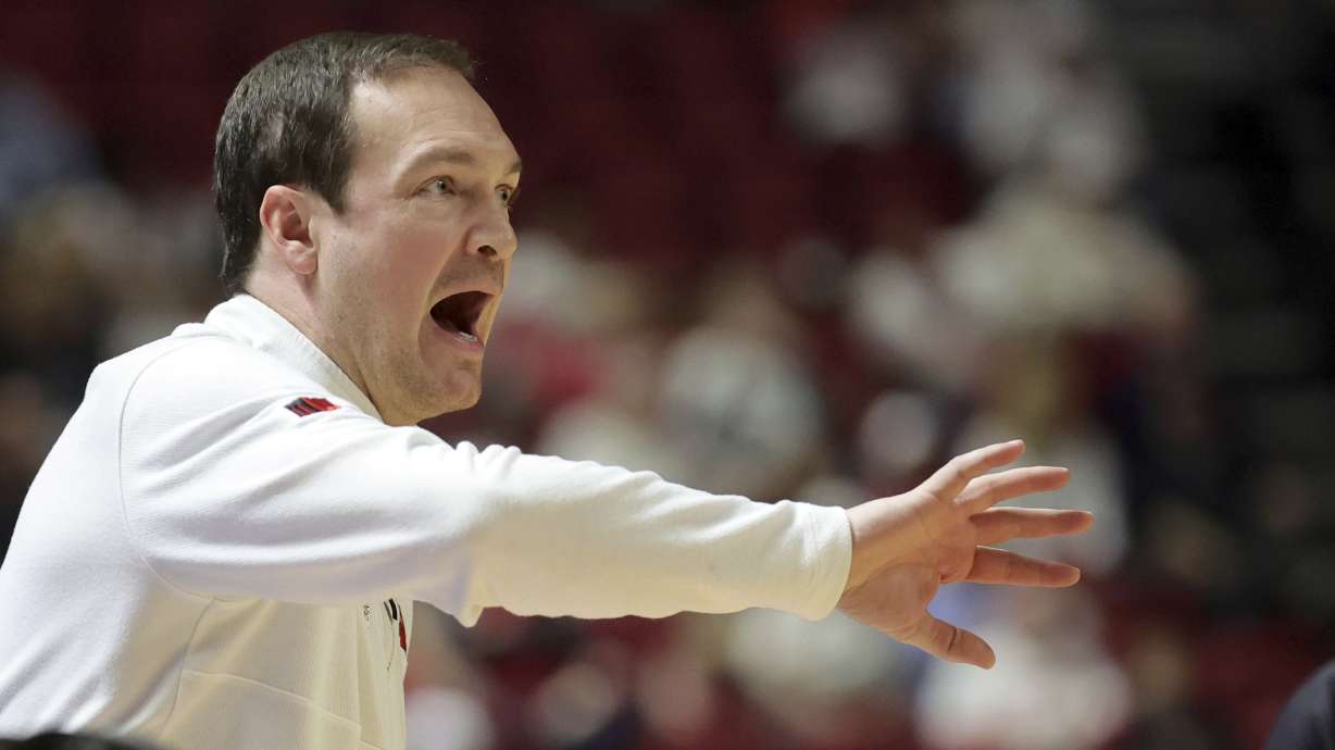 UNLV head coach Kevin Kruger calls out to players during the first half of an NCAA college basketball game against San Diego State, Tuesday, March 4, 2025, in Las Vegas.