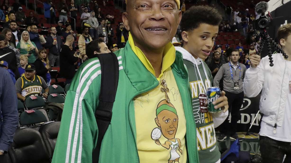 FILE - Former Seattle SuperSonics player Slick Watts stands courtside before an NBA basketball game on Friday, Oct. 5, 2018, in Seattle.