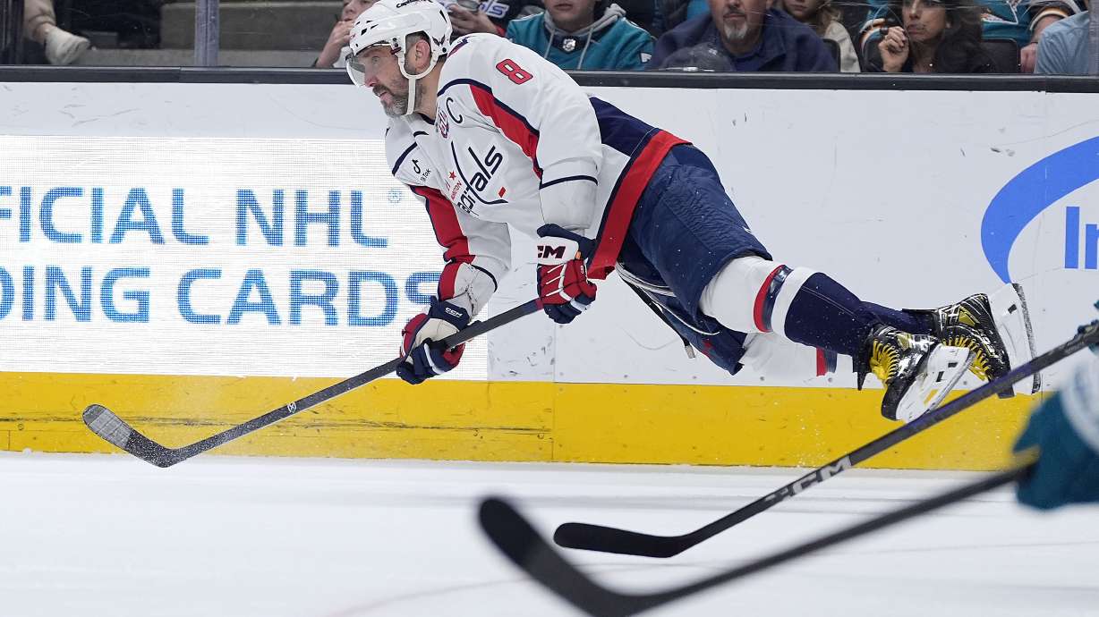 Washington Capitals left wing Alex Ovechkin dives for the puck during the second period against the San Jose Sharks in an NHL hockey game in San Jose, Calif., Saturday, March 15, 2025.