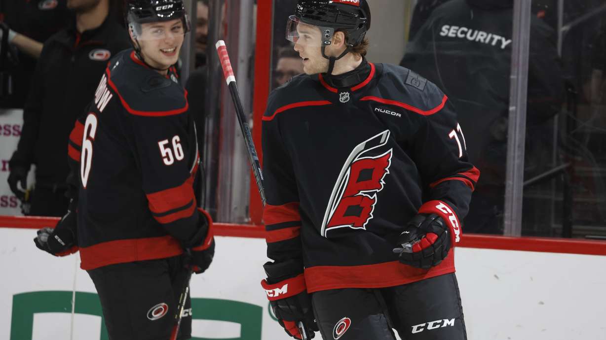 Carolina Hurricanes' Mark Jankowski (77) celebrates after his goal against the Winnipeg Jets during the first period of an NHL hockey game in Raleigh, N.C., Sunday, March 9, 2025.