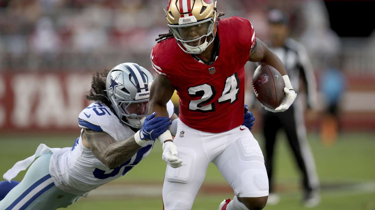 FILE - San Francisco 49ers running back Jordan Mason (24) runs in the first quarter during an NFL football game against the Dallas Cowboys, Oct. 27, 2024, in Santa Clara, Calif.