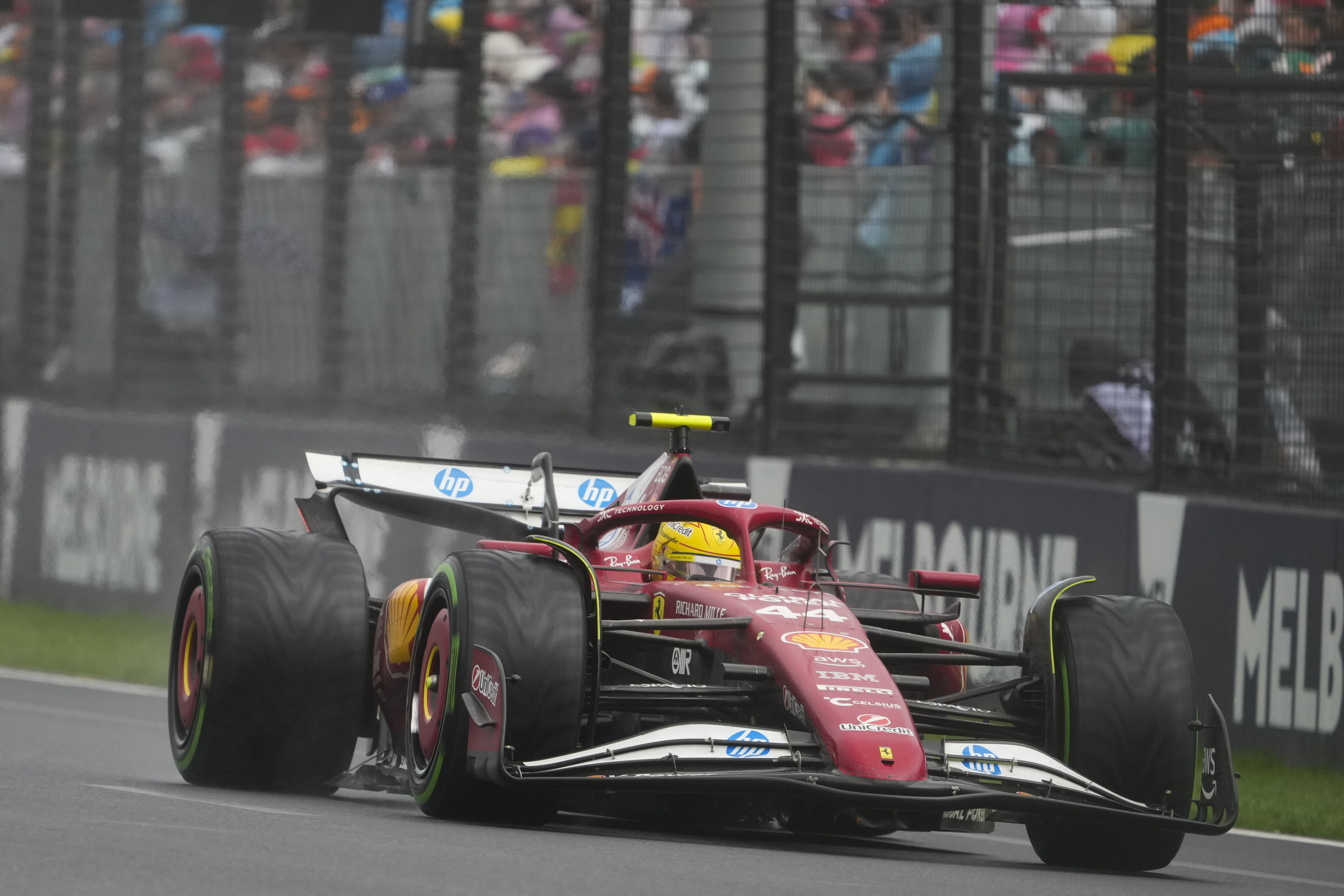 Ferrari driver Lewis Hamilton of Britain steers his car during the Australian Formula One Grand Prix at Albert Park, in Melbourne, Australia, Sunday, March 16, 2025.