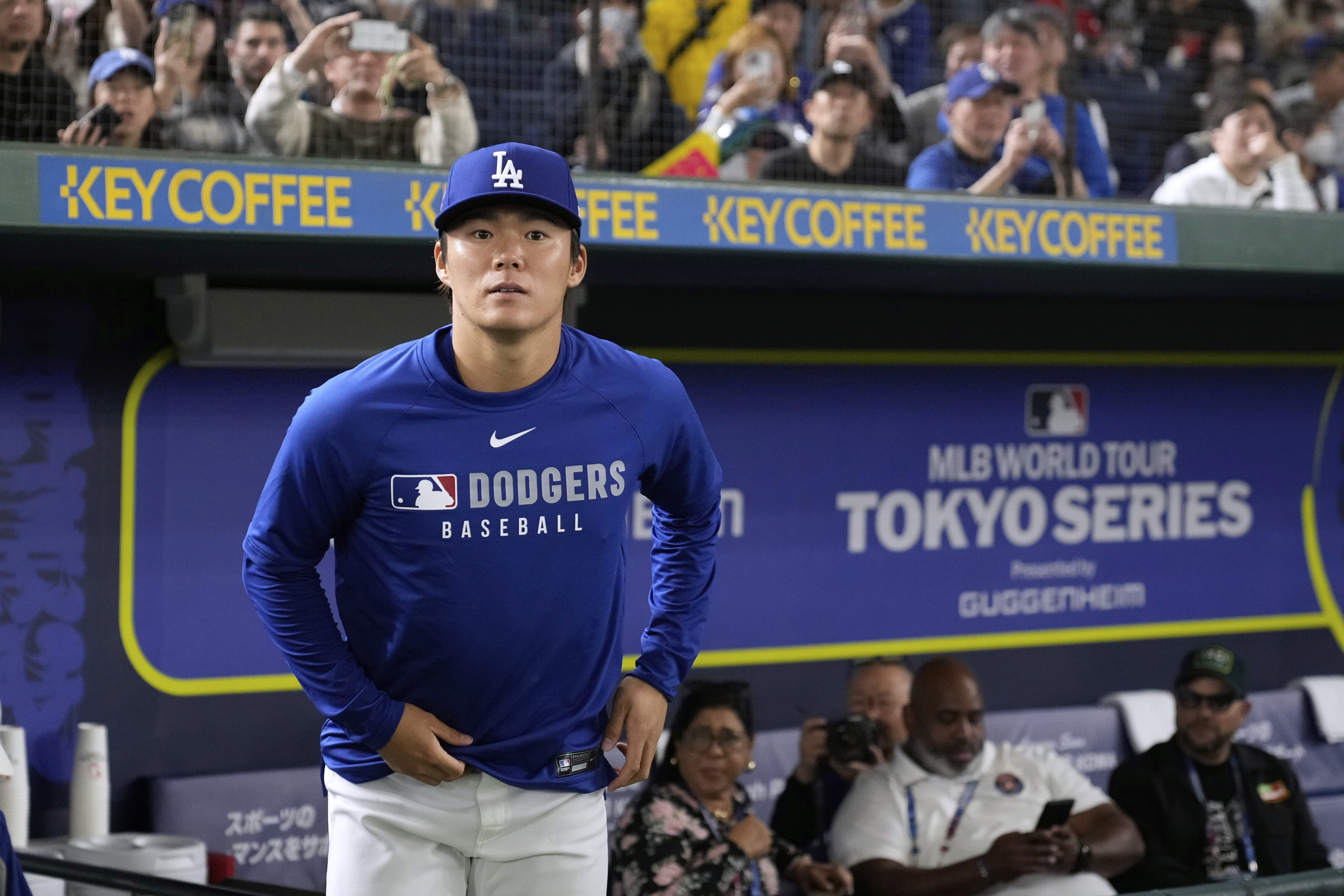 Yoshinobu Yamamoto, a pitcher of the Los Angeles Dodgers, starts a practice session at Tokyo Dome in Tokyo, Friday, March 14, 2025, as the Dodgers play their MLB opening games against the Chicago Cubs at the venue next week.
