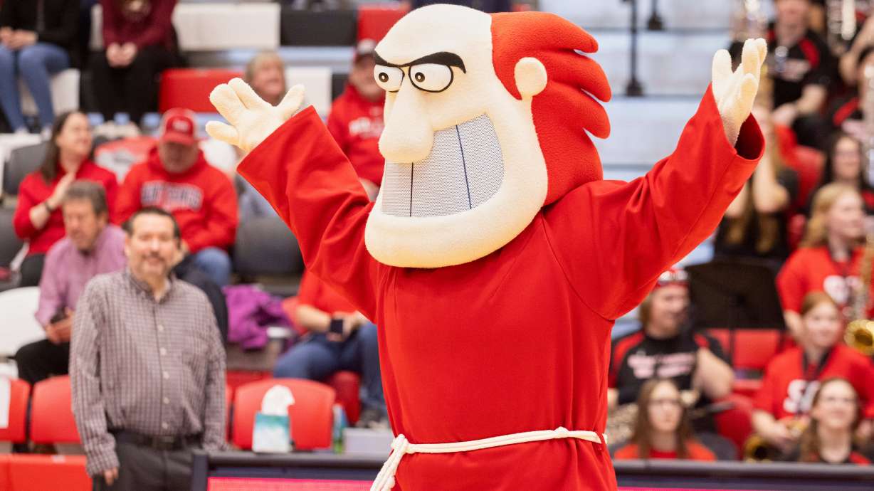 In this photo provided by Scott Stover, St. Francis University mascot Frankie the Friar performs Feb. 22, 2025, during an NCAA college basketball game in Loretto, Pa.