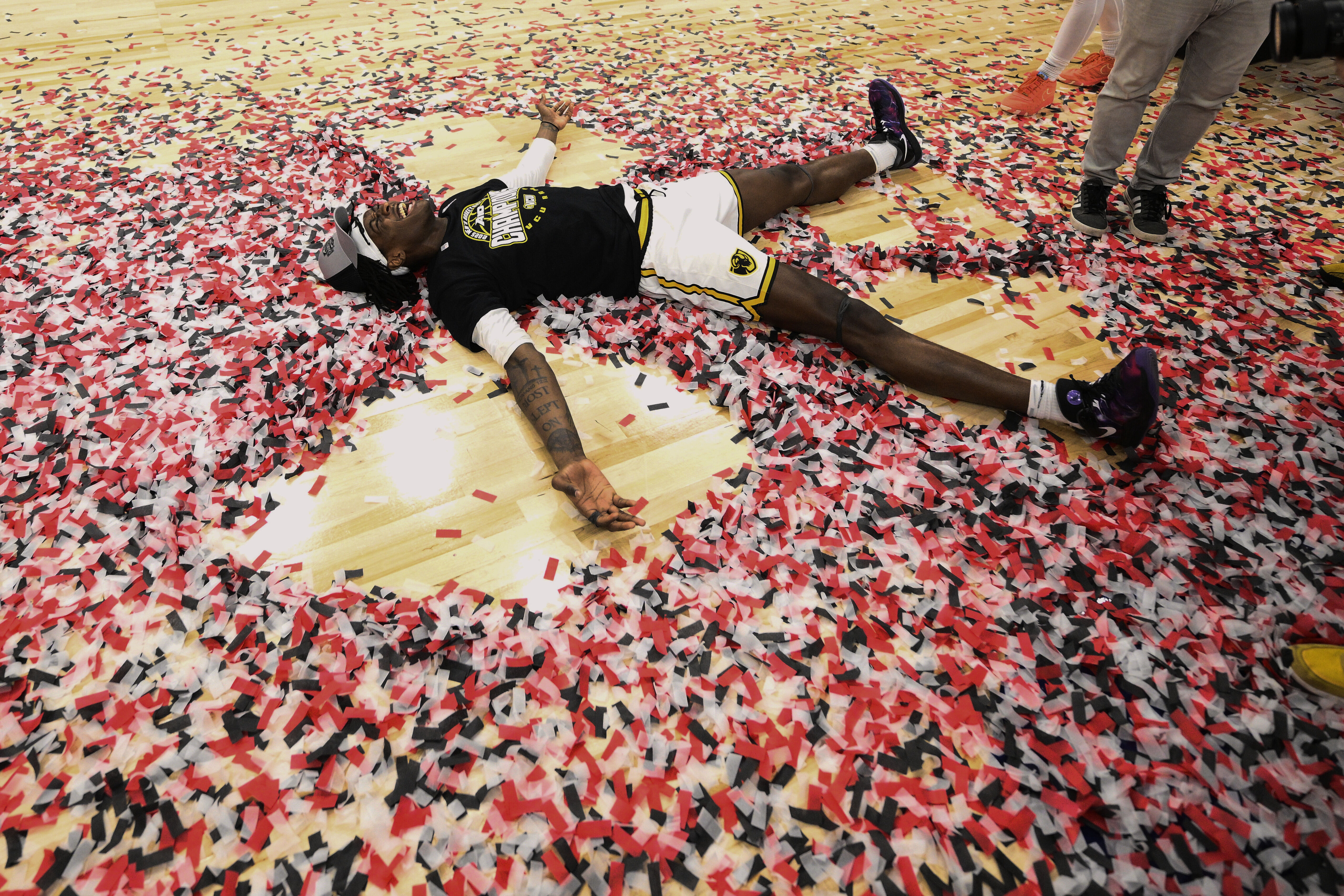 Virginia Commonwealth forward Christian Fermin celebrates after an NCAA college basketball game in the championship of the Atlantic 10 tournament, Sunday, March 16, 2025, in Washington.