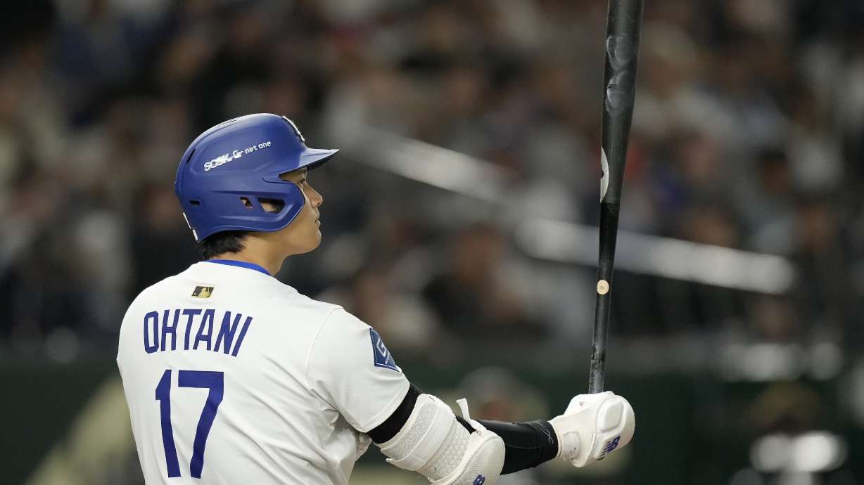 Los Angeles Dodgers' Shohei Ohtani (17) bats against the Hanshin Tigers during the third inning in an MLB Japan Series exhibition baseball game, Sunday, March 16, 2025, in Tokyo.