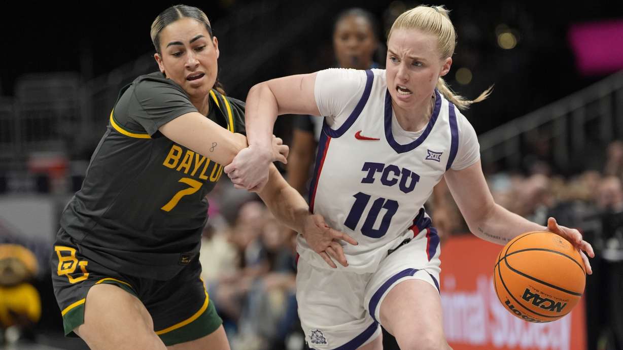 TCU guard Hailey Van Lith (10) drives past Baylor guard Waiata Jennings (7) during the second half of an NCAA college basketball game for the Big 12 women's tournament championship Sunday, March 9, 2025, in Kansas City, Mo.