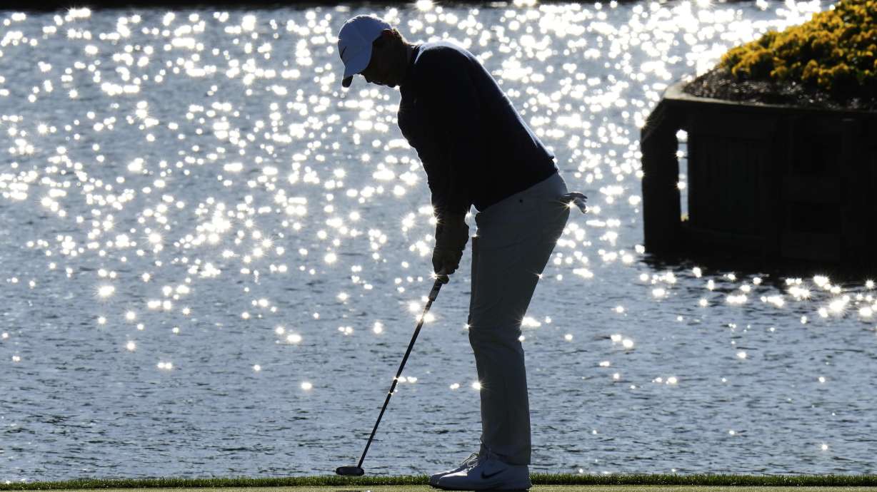 Rory McIlroy, of Northern Ireland, putts on the 17th green during a playoff round of The Players Championship golf tournament Monday, March 17, 2025, in Ponte Vedra Beach, Fla.
