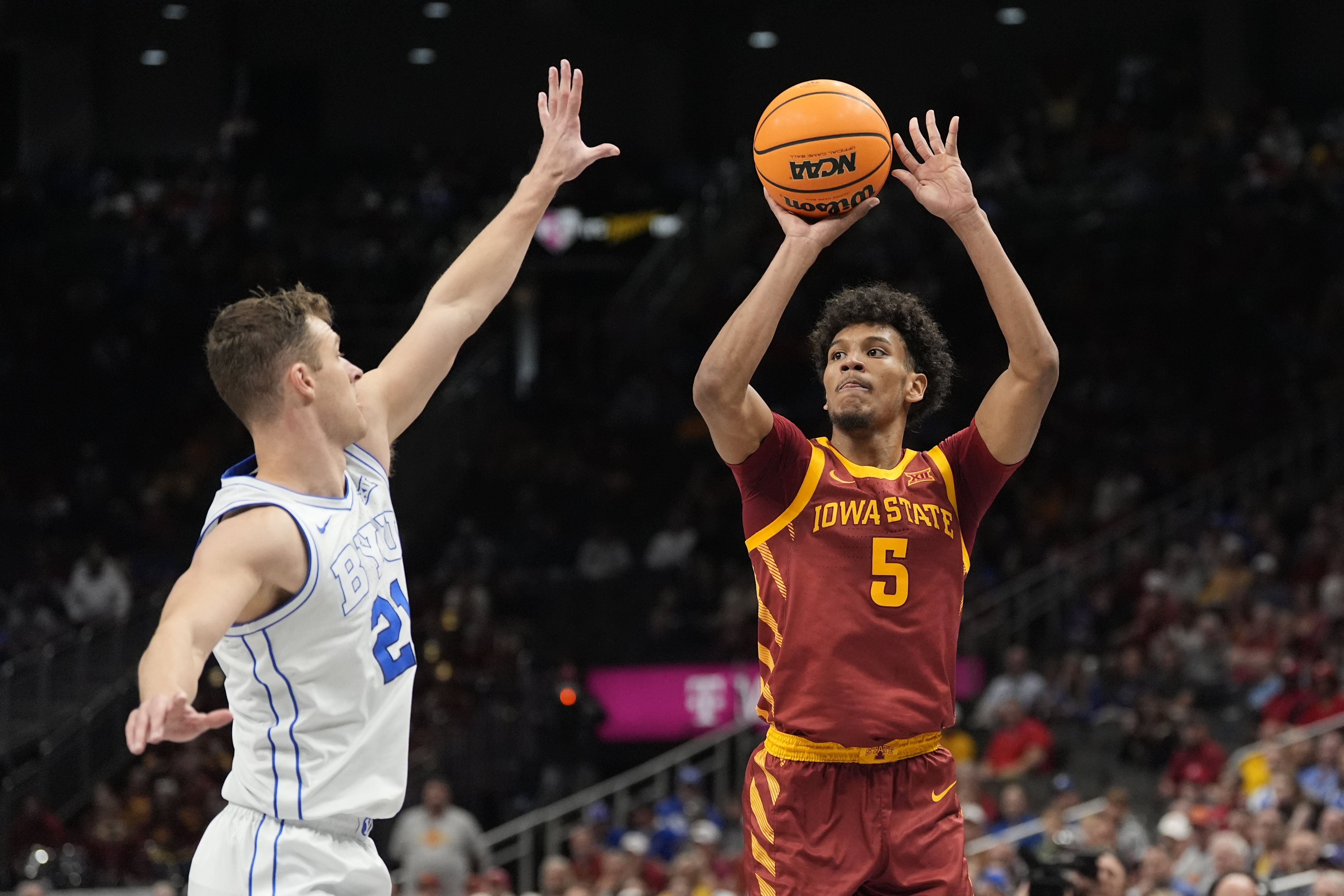 Iowa State's Curtis Jones (5) shoots over Brigham Young's Trevin Knell (21) during the first half of an NCAA college basketball game in the quarterfinal round of the Big 12 Conference tournament, Thursday, March 13, 2025, in Kansas City, Mo.