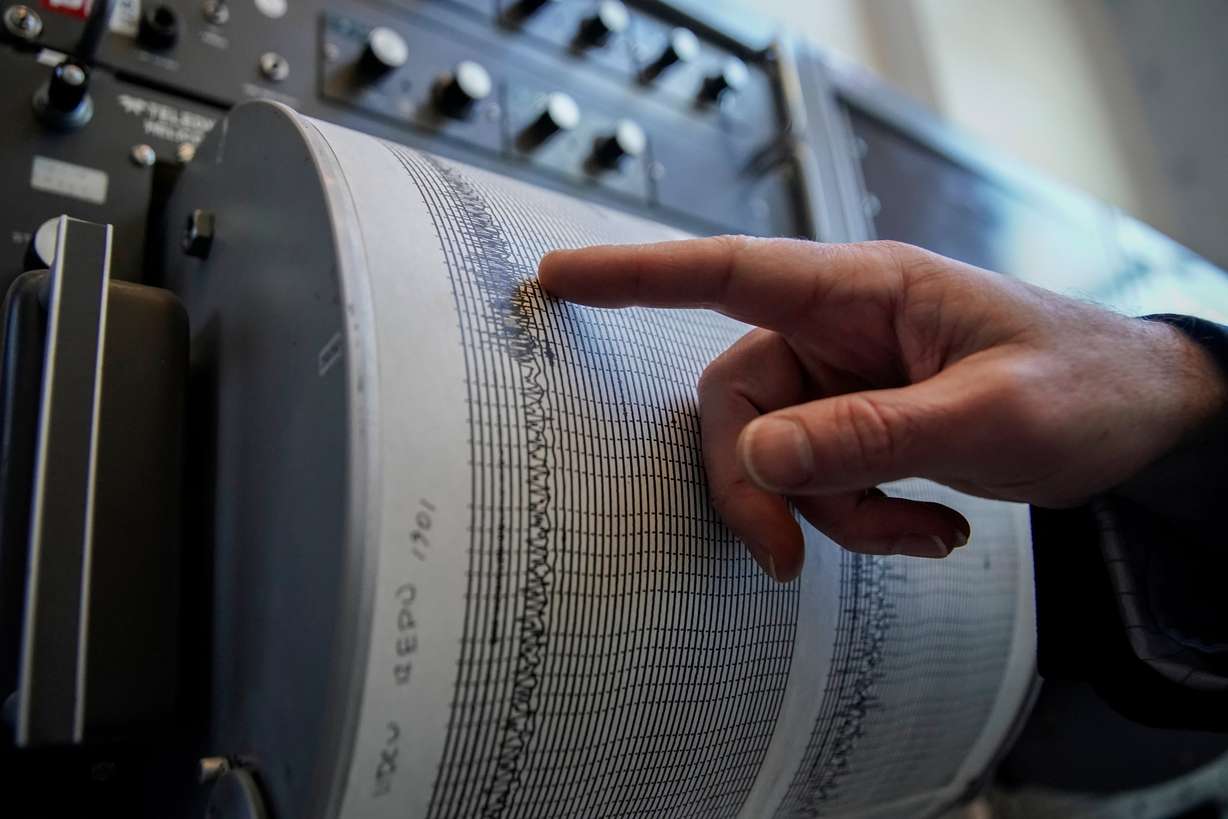 Dr. Keith Koper, director of University of Utah Seismograph Stations, shows an earthquake pattern from a seismometer in Salt Lake City on Jan. 28, 2022.