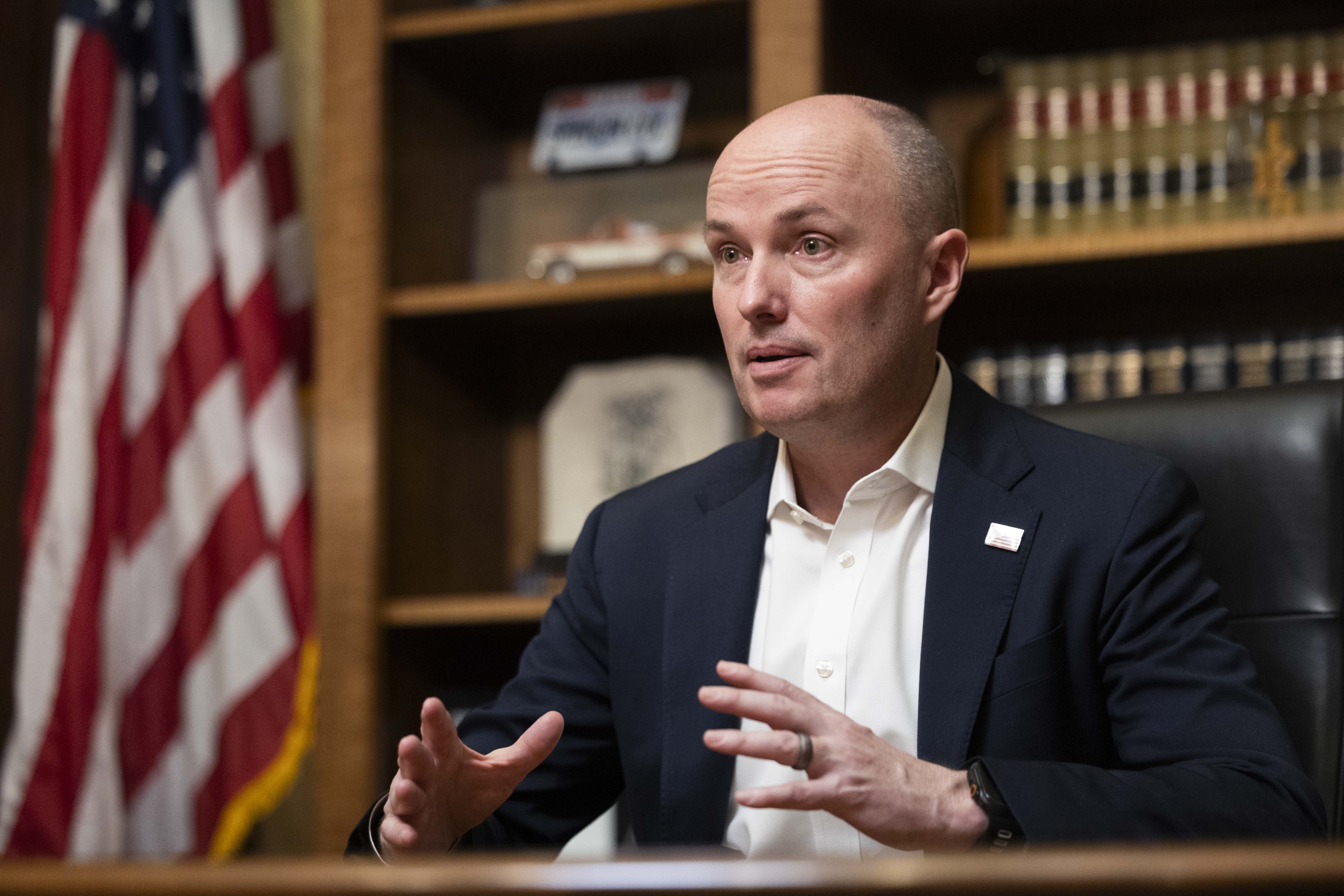 Gov. Spencer Cox answers questions in Salt Lake City on March 7. Following last week's mass layoffs in the U.S. Department of Education, Cox wrote an op-ed strongly supporting the move.