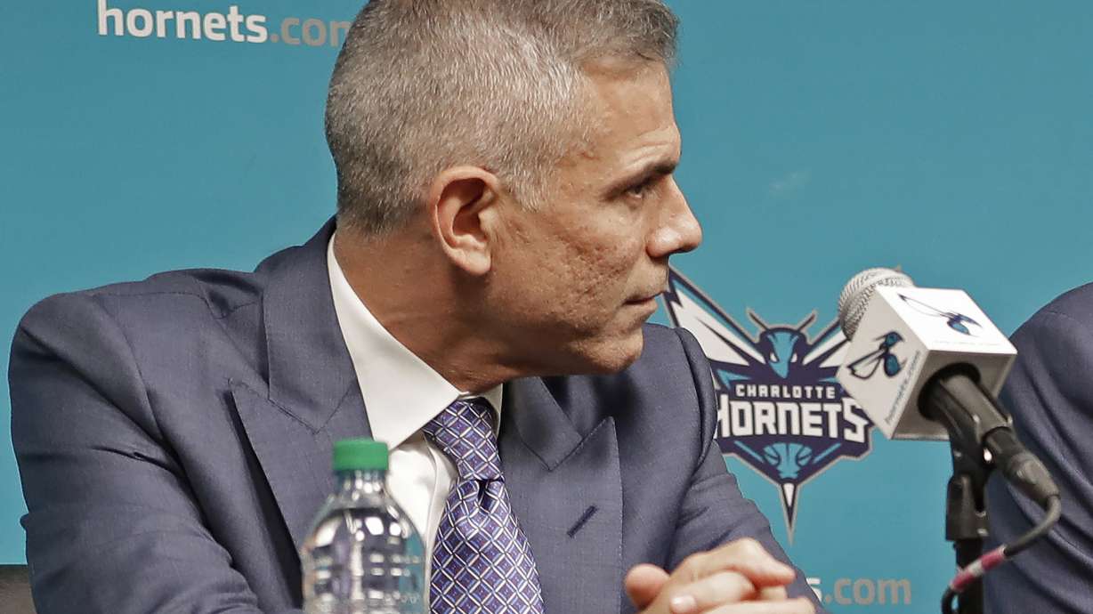 FILE - Hornets managing partner Curtis Polk, left, looks on during a news conference for the NBA basketball team in Charlotte, N.C., Tuesday, April 10, 2018.