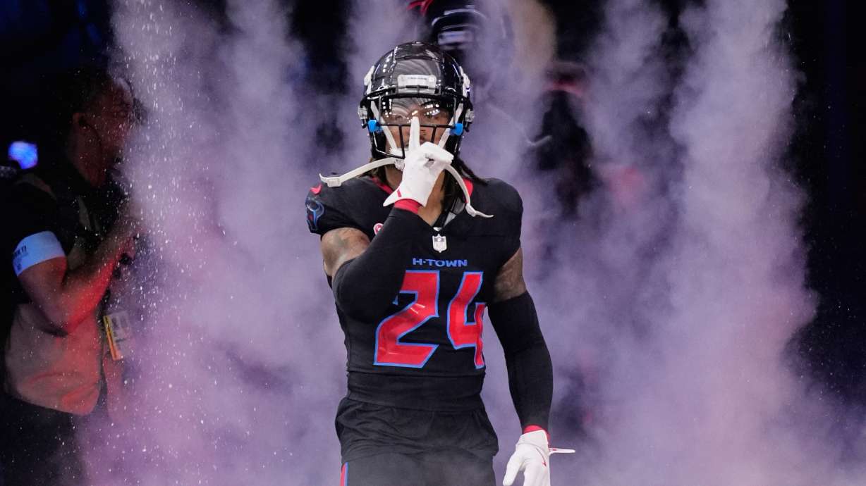 FILE - Houston Texans cornerback Derek Stingley Jr. (24) gestures as he is introduced before an NFL football game against the Baltimore Ravens Wednesday, Dec. 25, 2024, in Houston.