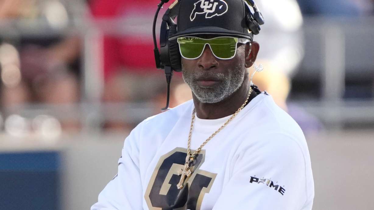 FILE - Colorado head coach Deion Sanders watches during the first half during an NCAA college football game against Arizona, Saturday, Oct. 19, 2024, in Tucson, Ariz.