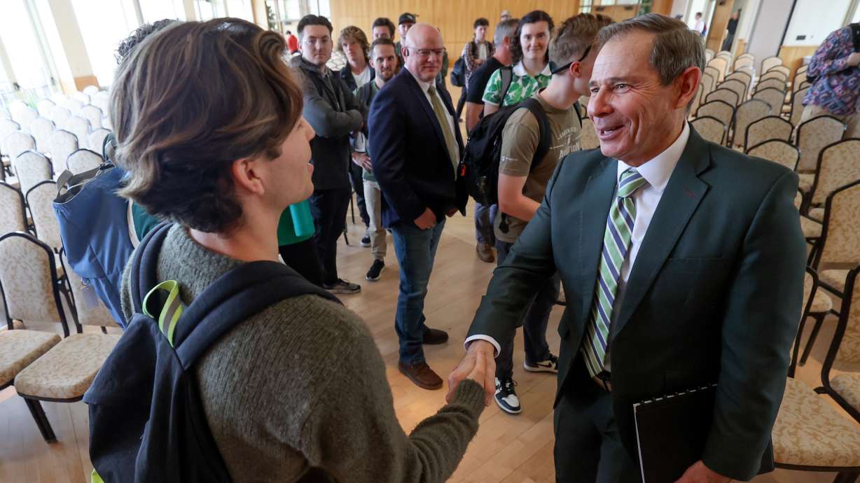 BYU junior Cal Nielson shakes hands with Sen. John Curtis, R-Utah, after Curtis spoke to BYU students and faculty about "Inspiring the Next Generation of Public Servants" at the Gordon B. Hinckley Alumni and Visitors Center in Provo on Monday.
