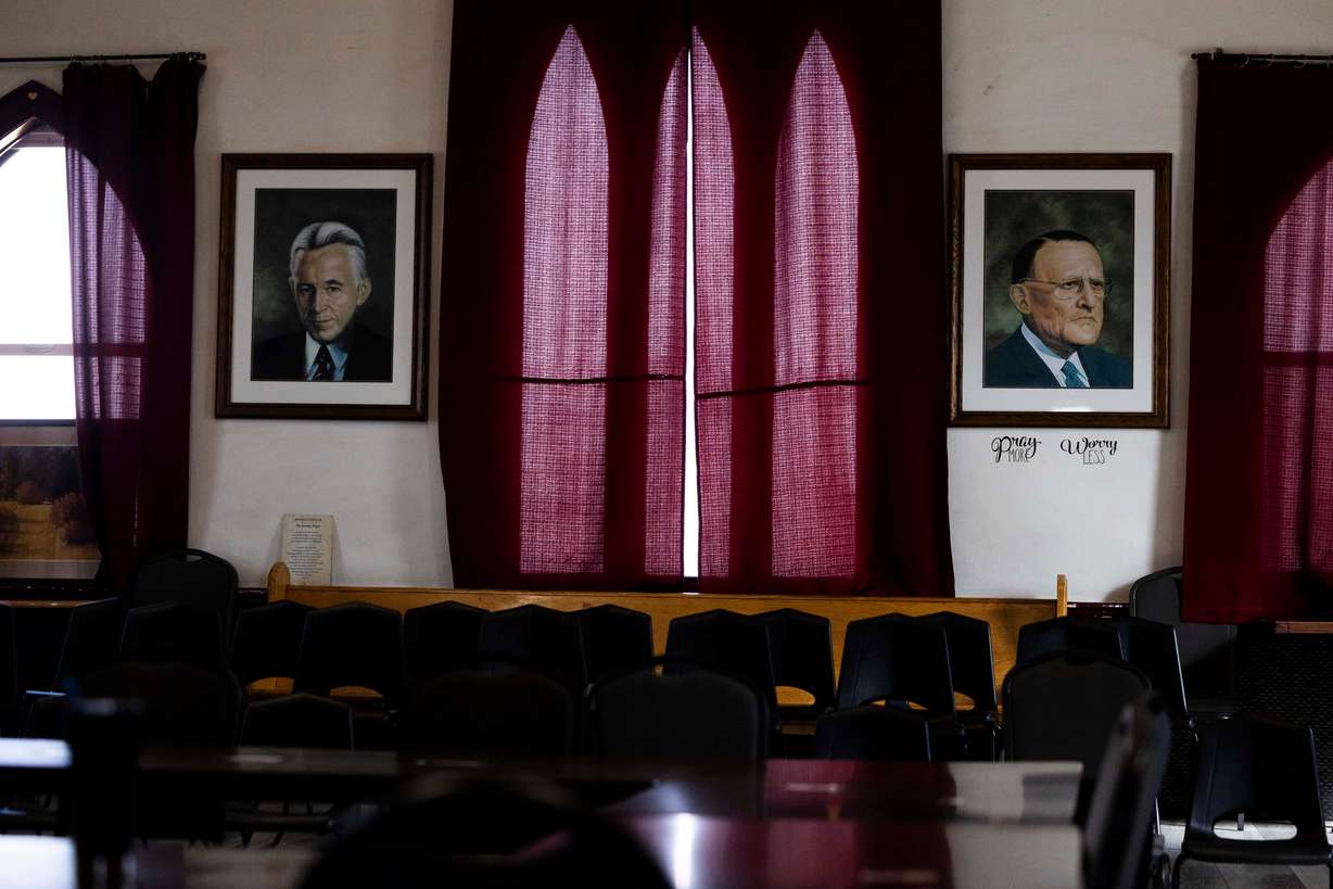 Portraits of Alcoholic Anonymous founders Bill Wilson, left, and Dr. Bob Smith, right, hang in a meeting room for AA in the Alano Club in Murray on March 4.