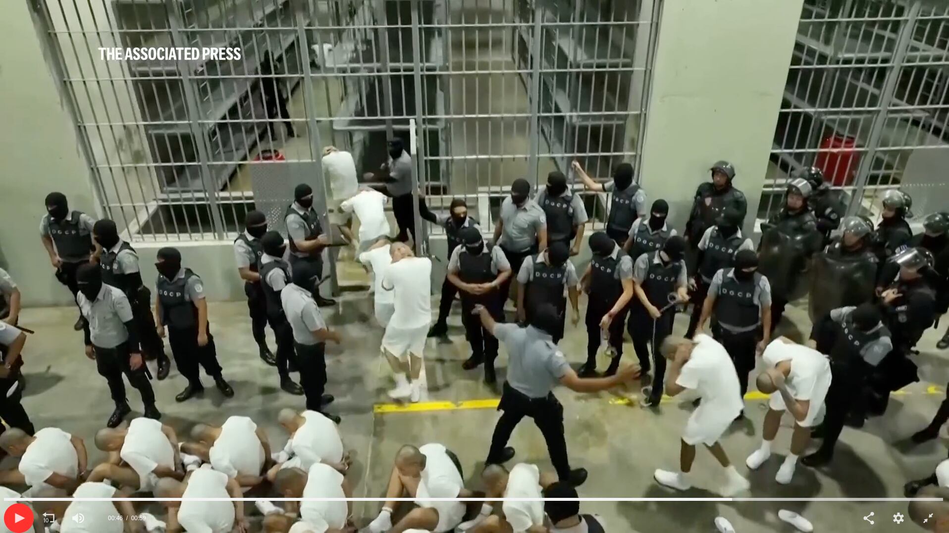 Hundreds of immigrants are pictured in this video screenshot being brought into a detention center over the weekend. A federal judge unsuccessfully sought to block the administration's actions.