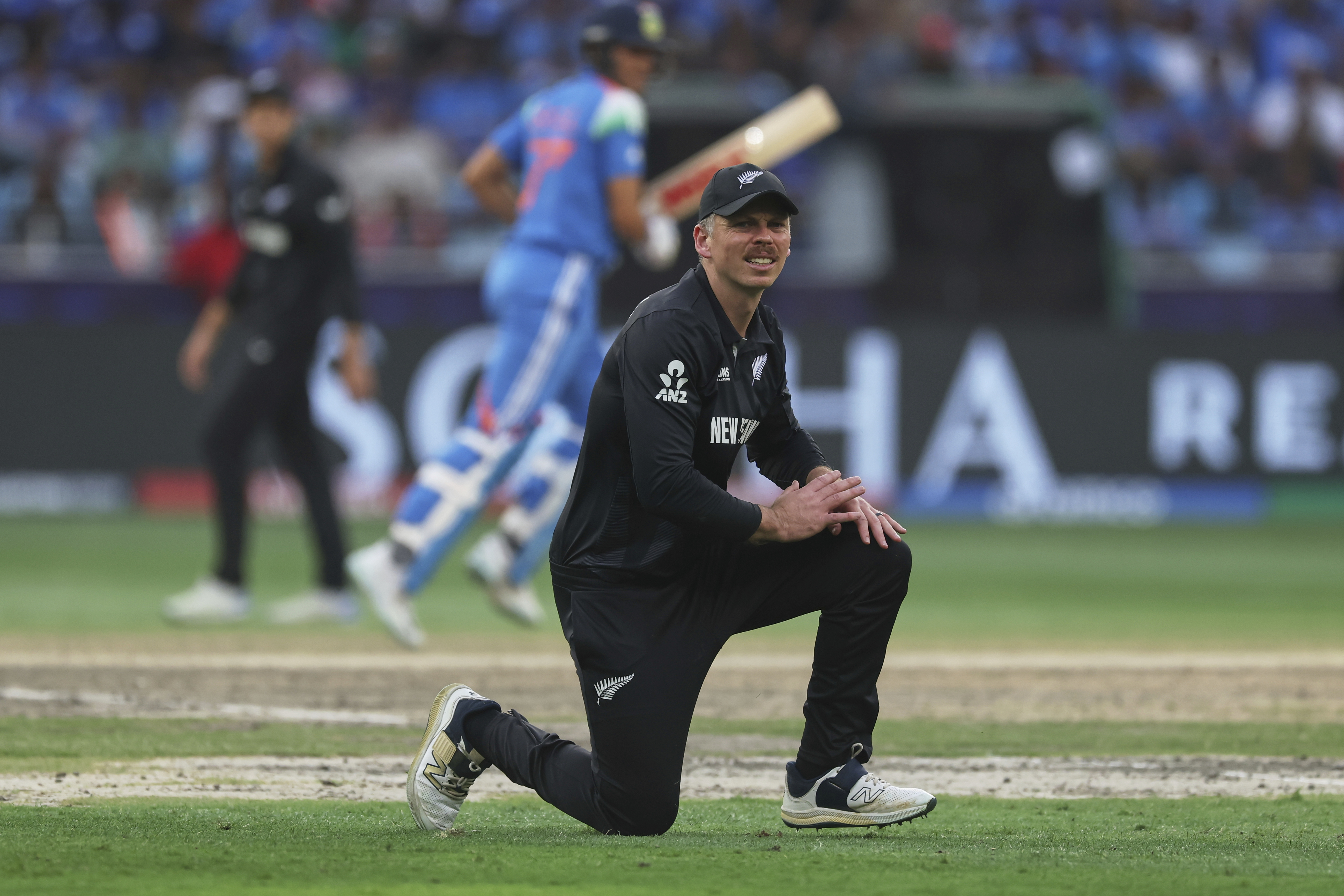 New Zealand's Michael Bracewell reacts in the field during the ICC Champions Trophy final cricket match between India and New Zealand at Dubai International Cricket Stadium in Dubai, United Arab Emirates, Sunday, March 9, 2025.