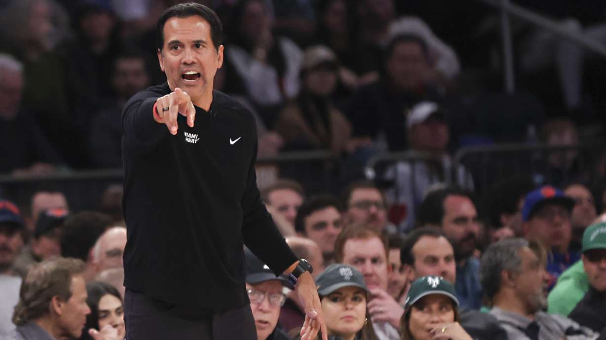 Miami Heat head coach Erik Spoelstra points from the sideline during the first half of an NBA basketball game against the New York Knicks, Monday, March 17, 2025, in New York.