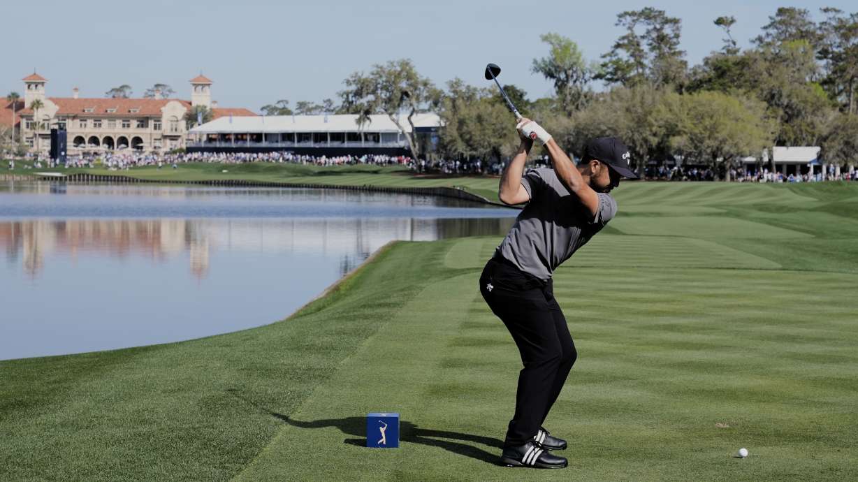 Xander Schauffele tees off on the 18th hole during the second round of The Players Championship golf tournament Friday, March 14, 2025, in Ponte Vedra Beach, Fla.