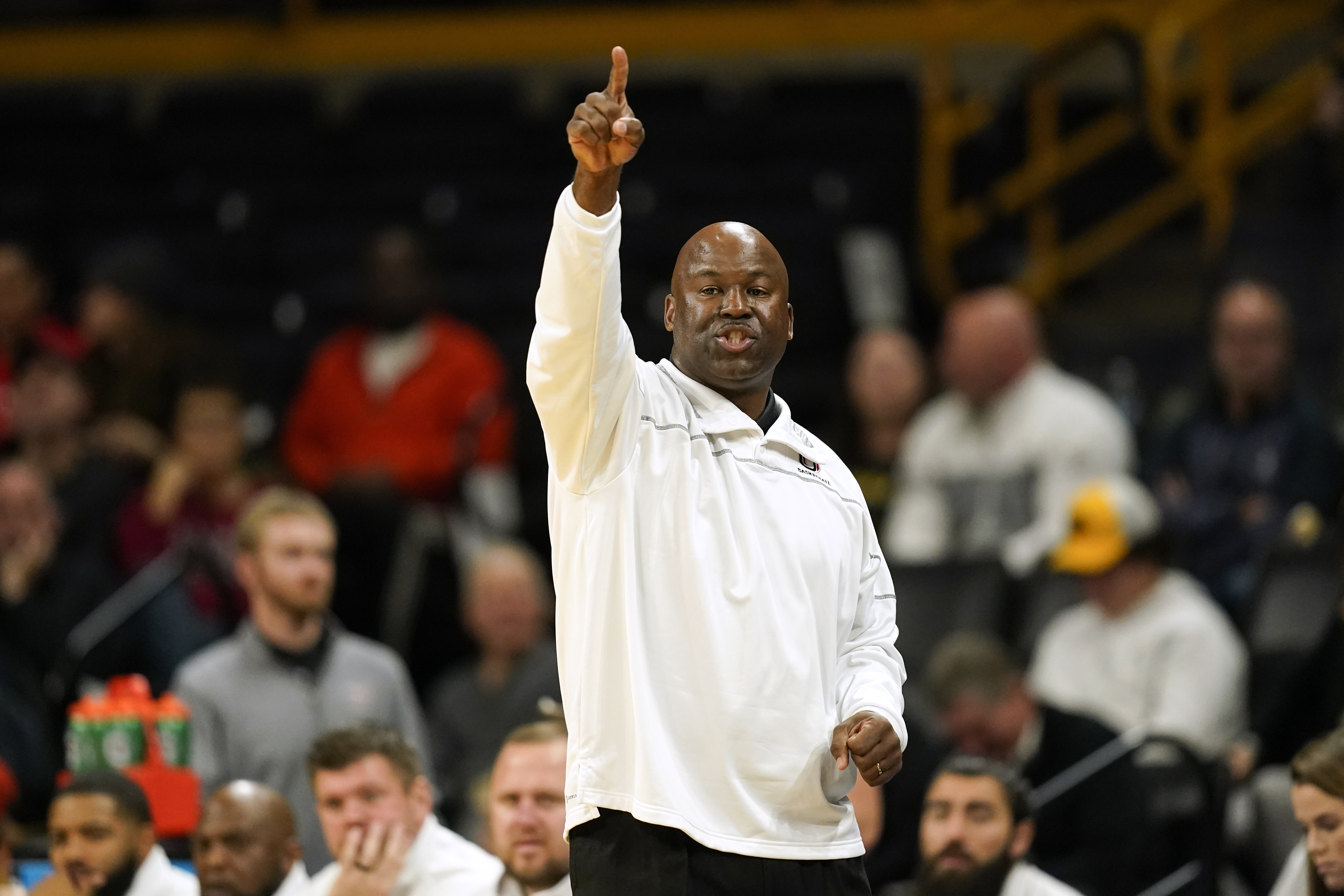 FILE - Omaha head coach Chris Crutchfield directs his team during the first half of an NCAA college basketball game against Iowa, Monday, Nov. 21, 2022, in Iowa City, Iowa. Iowa won 100-64.