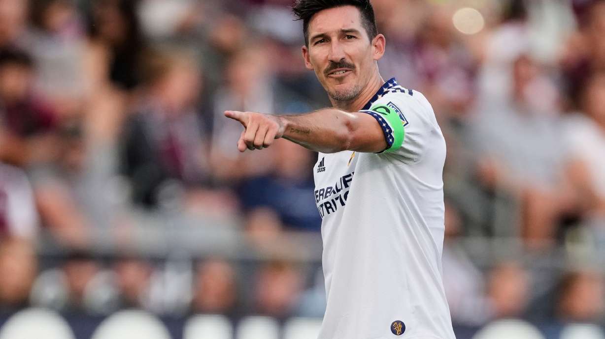 FILE - Los Angeles Galaxy midfielder Sacha Kljestan (16) directs teammates during the first half of an MLS soccer match Saturday, July 16, 2022, in Commerce City, Colo.