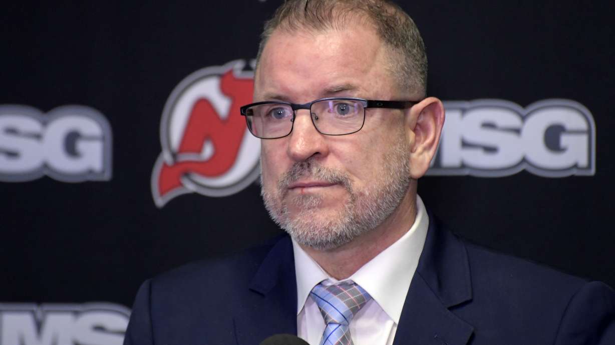 FILE - New Jersey Devils general manager Tom Fitzgerald speaks during an NHL hockey news conference, Tuesday, Nov. 30, 2021, in Newark, N.J.
