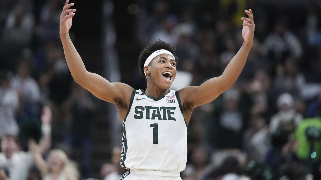 Michigan State guard Jeremy Fears Jr. (1) reacts to a basket against Wisconsin during the second half of an NCAA college basketball game in the semifinals of the Big Ten Conference tournament in Indianapolis, Saturday, March 15, 2025.