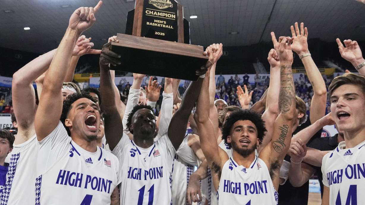 High Point players celebrate after winning the Big South Championship NCAA college basketball game against Winthrop, Sunday, March 9, 2025, in Johnson City, Tenn.